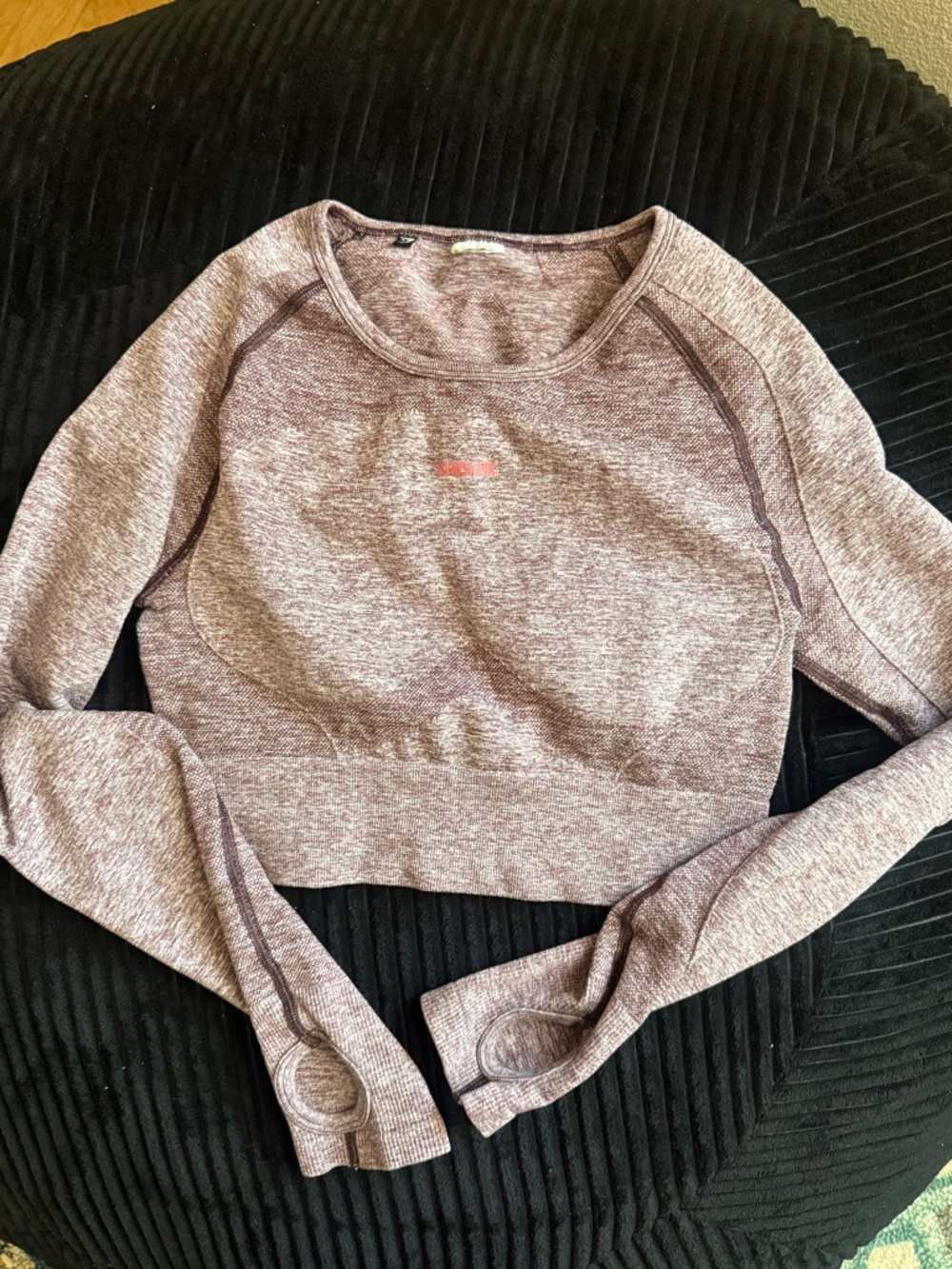 Gymshark crop, long sleeve shirt with cut out back.